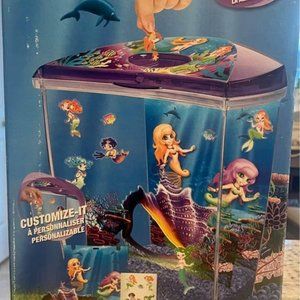 Marina 2.65 gallon aquarium set with extra fish supplis included.